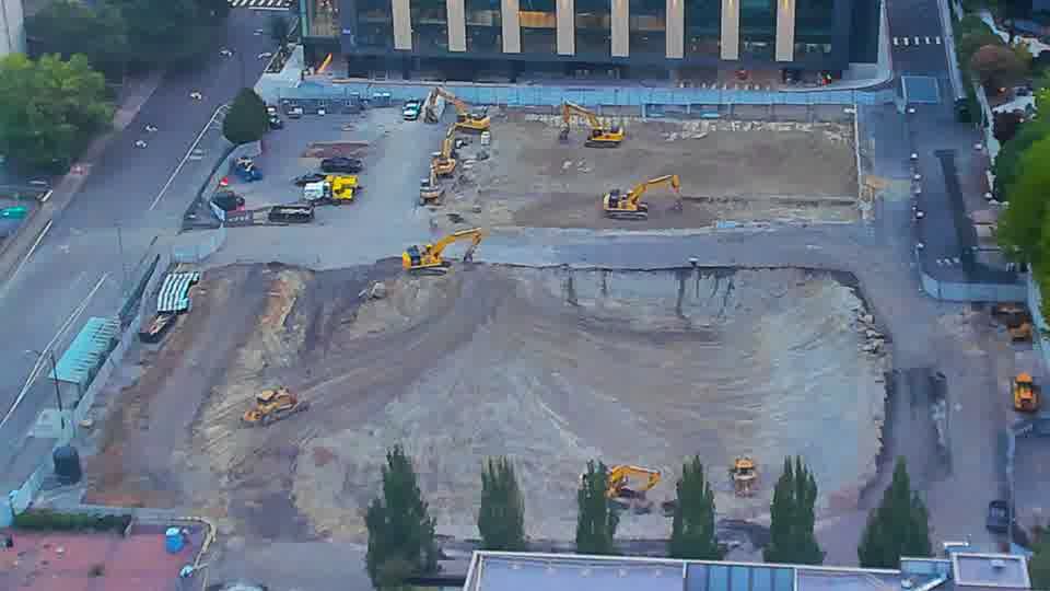 The arrangement of equipment across the site remains consistent, with no observable shifts in position over the last fifteen minutes.