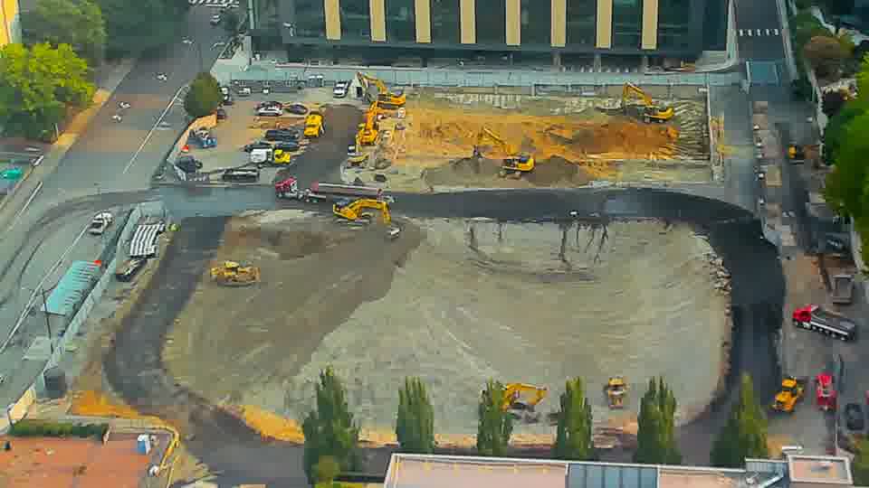 The overall scene presents a static view, with the positions of equipment and materials appearing unchanged.