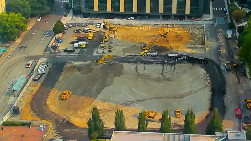 The site remains in a holding pattern, with no readily apparent adjustments to the location of machinery or materials.
