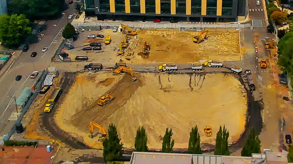 The machinery across the site holds its positions, showing no significant movement in the last quarter of an hour.