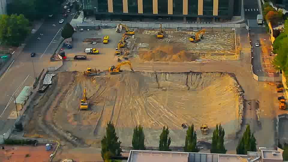 The construction site remains quiet, with no apparent movement of machinery or materials during this interval.