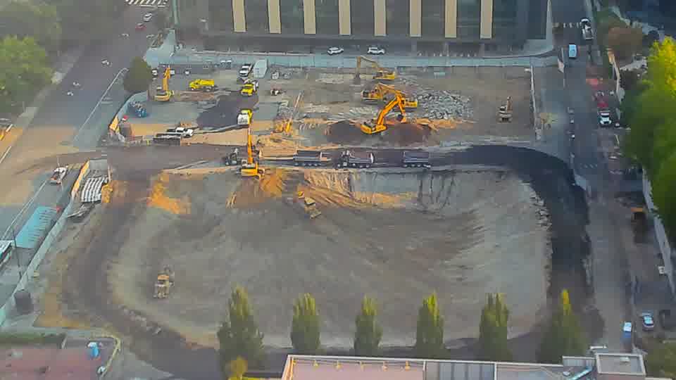 The central area of the site displays a subtle shift in the pattern of worked earth, indicating some continued movement of material.