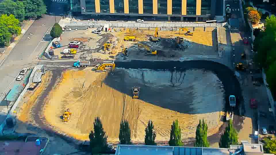 The worked area shows a slight shift in patterns, with some re-shaping of the material across the site.