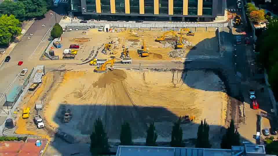 The arrangement of equipment appears consistent between these views, though subtle shifts in the worked area are visible.