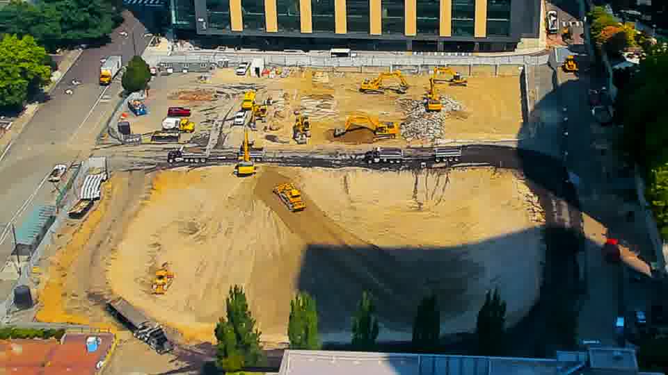 The scene presents a largely static picture, with the arrangement of heavy equipment appearing consistent across the site.