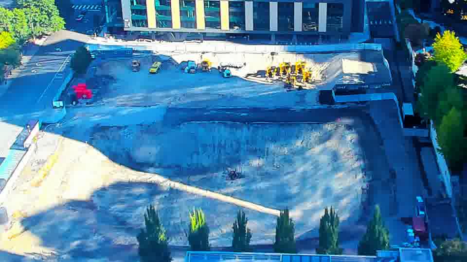 Construction camera frame at 9:30 AM PT. The scene remains stable, with equipment and materials appearing in the same positions as before.