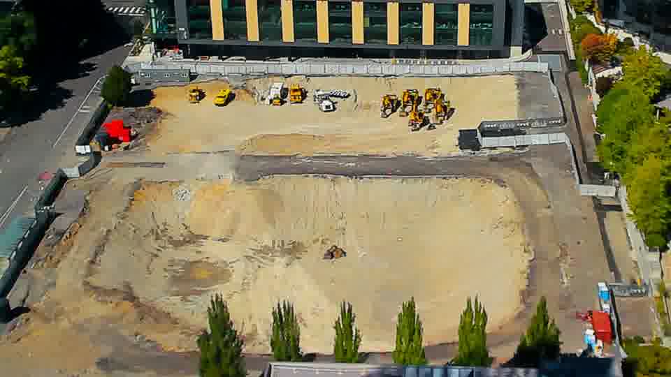Construction camera frame at 2:30 PM PT. The scene shows no notable differences, with all equipment remaining in the same positions as fifteen minutes ago.