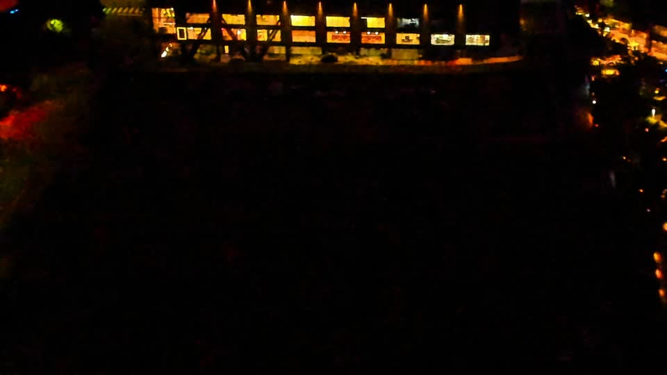 Construction camera frame at 11:00 PM PT. No construction activity — the site is quiet.