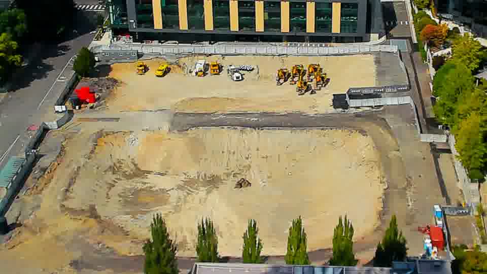 Construction camera frame at 2:30 PM PT. The scene remains stable, with no apparent shifts in the arrangement of equipment or vehicles.