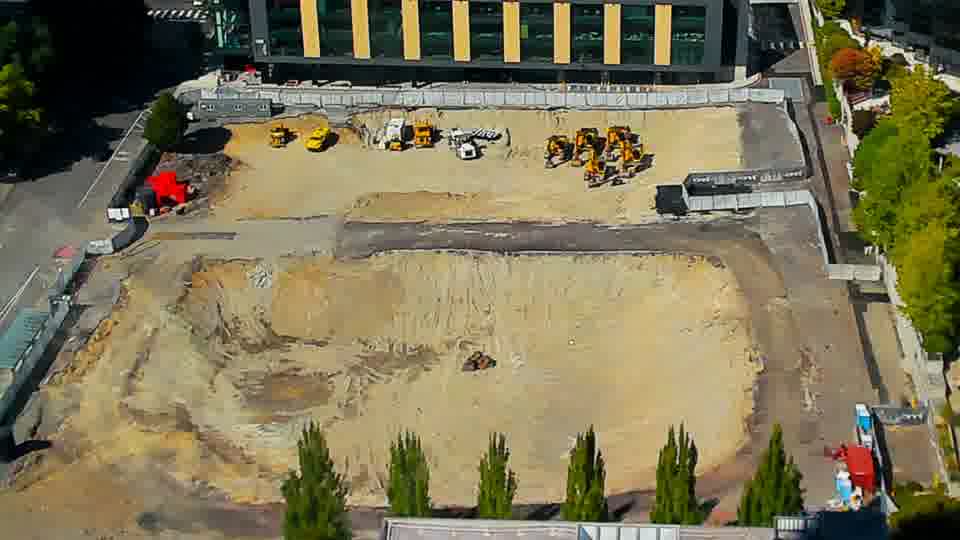 Construction camera frame at 3:00 PM PT. The site maintains a steady state, with all visible machinery and vehicles remaining in the same positions.