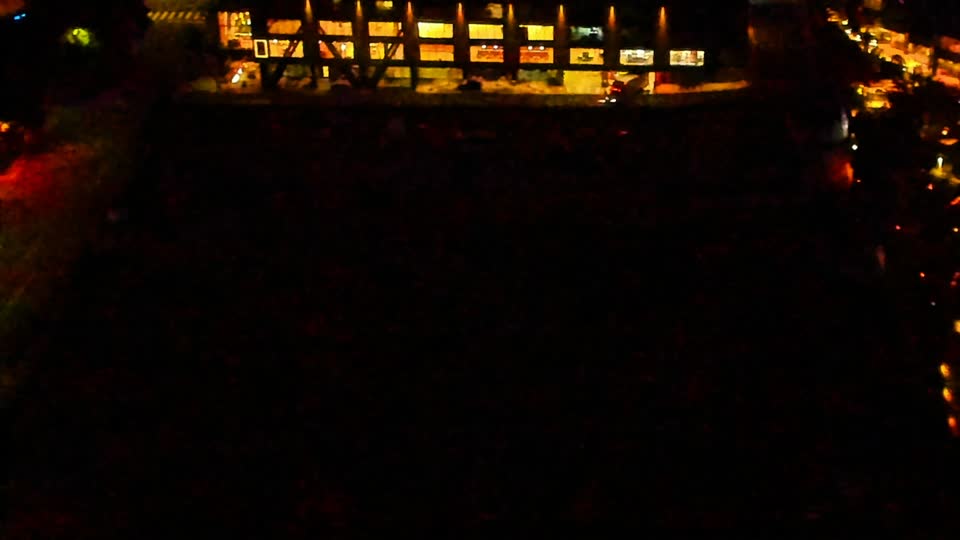 Construction camera frame at 5:00 AM PT. Visibility is too low to assess construction activity.
