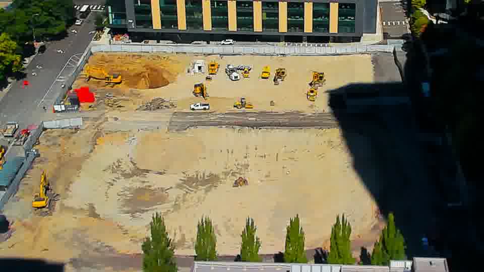 Construction camera frame at 12:30 PM PT. No visible change between these frames.