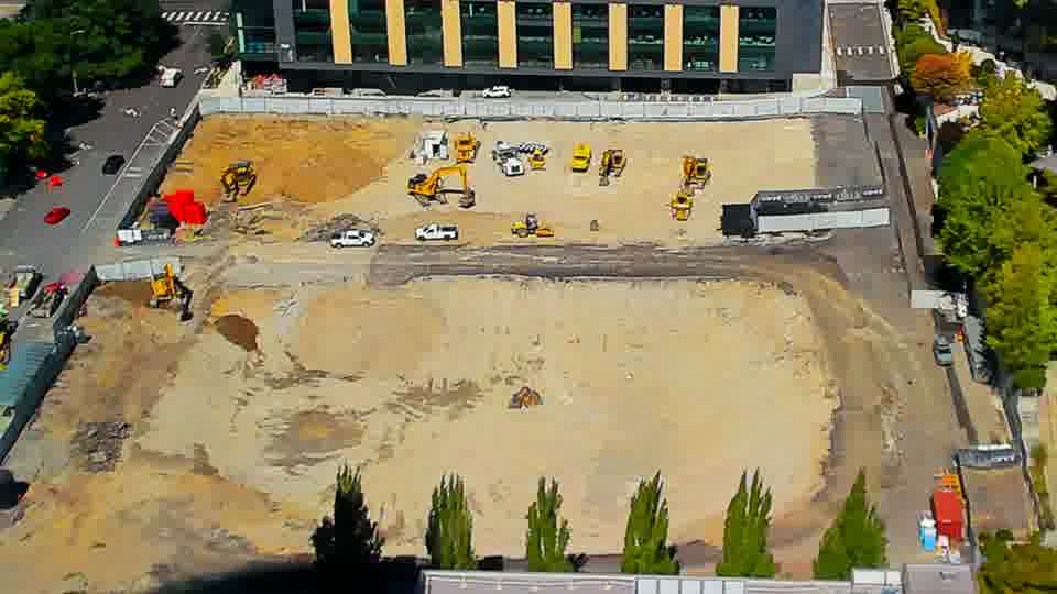 Construction camera frame at 1:15 PM PT. No visible change between these frames.