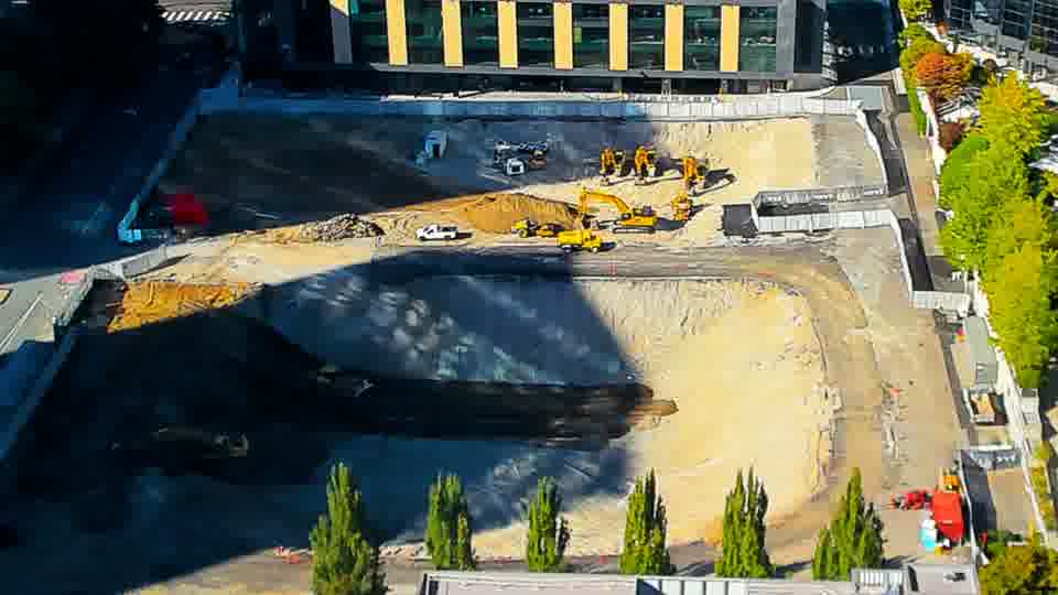Construction camera frame at 4:15 PM PT. No visible change between these frames.