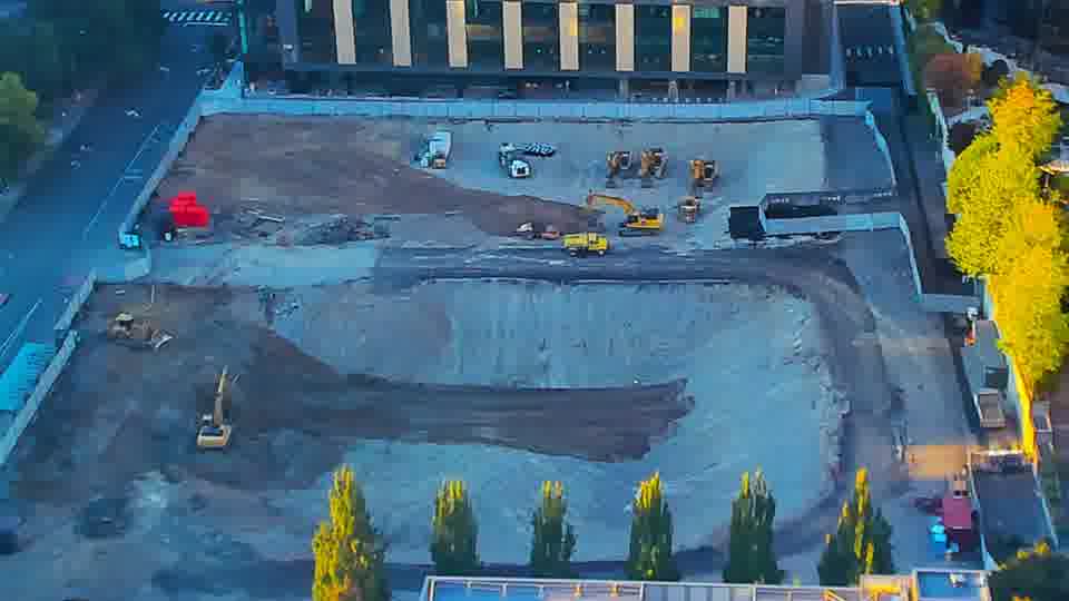 Construction camera frame at 7:00 PM PT. No visible change between these frames.