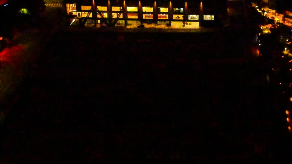 Construction camera frame at 4:00 AM PT. Visibility is too low to assess construction activity.