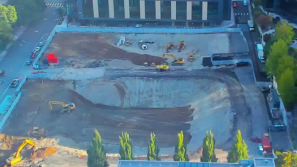 Construction camera frame at 8:00 AM PT. No visible change between these frames.