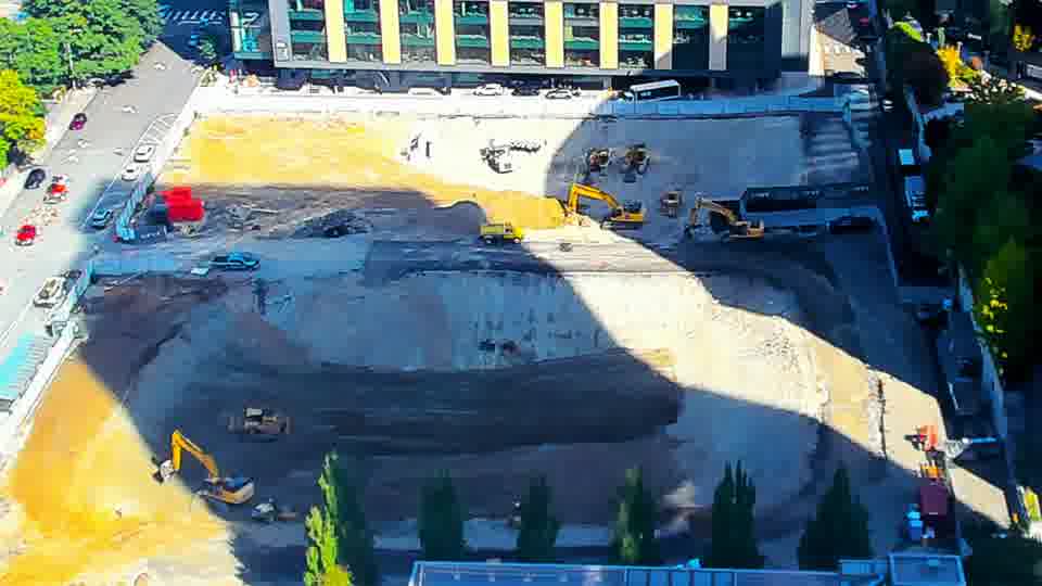 Construction camera frame at 11:15 AM PT. No visible change between these frames.