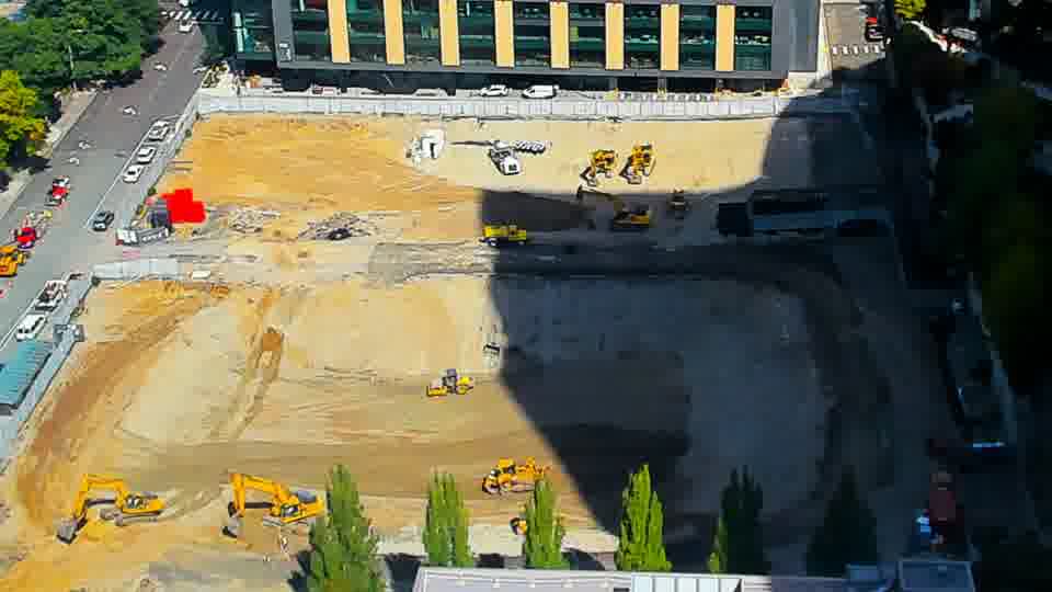 Construction camera frame at 12:00 PM PT. No visible change between these frames.