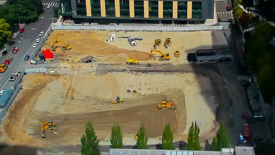 Construction camera frame at 12:30 PM PT. No visible change between these frames.