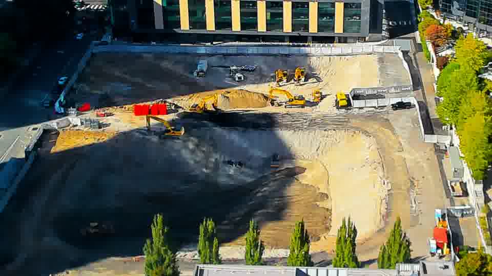Construction camera frame at 4:15 PM PT. No visible change between these frames.