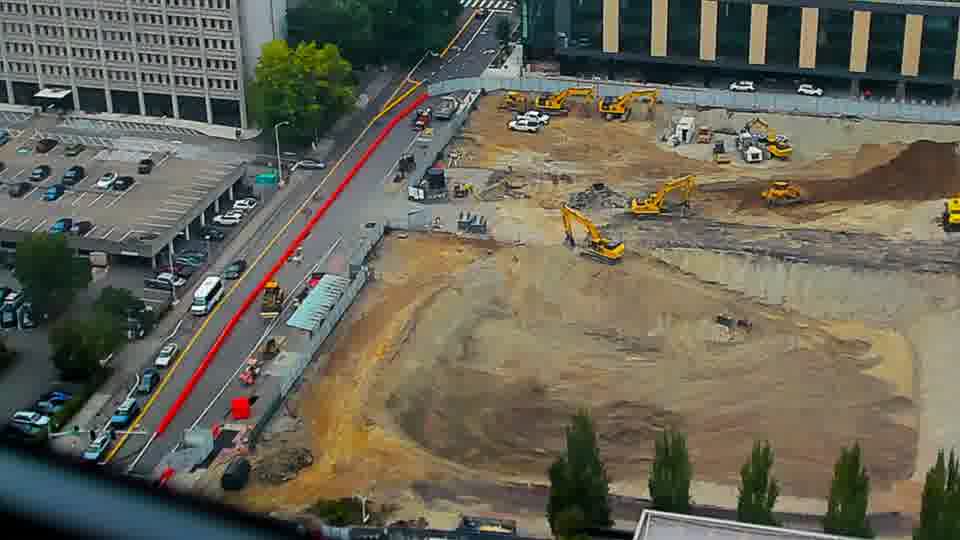 Construction camera frame at 11:15 AM PT. No visible change between these frames.