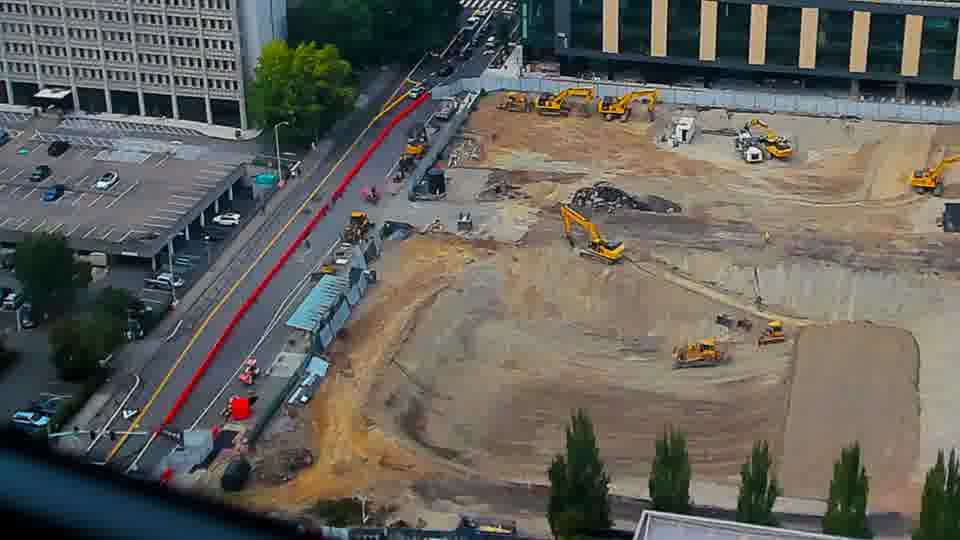 Construction camera frame at 4:15 PM PT. No visible change between these frames.