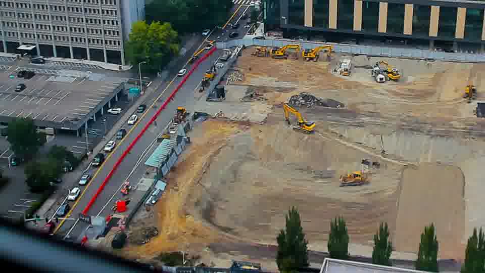 Construction camera frame at 5:15 PM PT. No visible change between these frames.