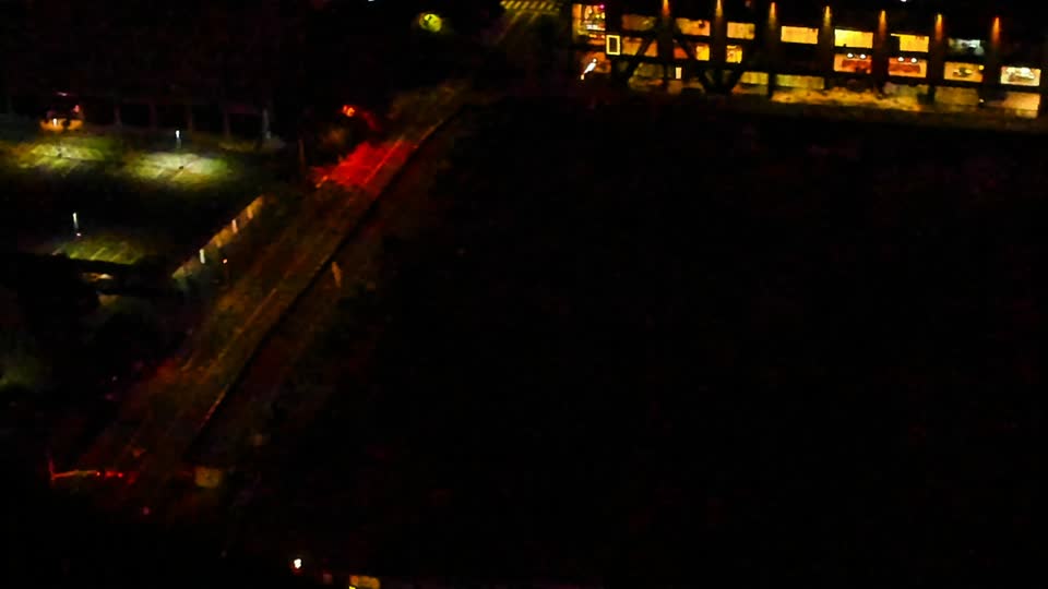 Construction camera frame at 3:00 AM PT. Visibility is too low to assess construction activity.