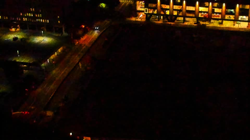 Construction camera frame at 6:00 AM PT. Visibility is too low to assess construction activity.