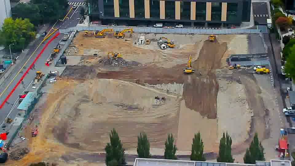 Construction camera frame at 8:30 AM PT. No visible change between these frames.