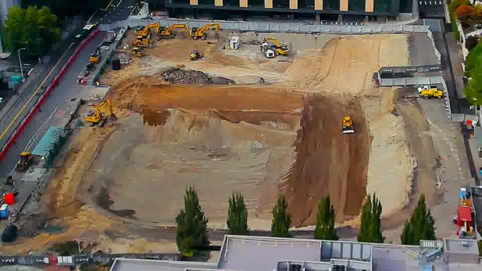 Construction camera frame at 4:15 PM PT. No visible change between these frames.