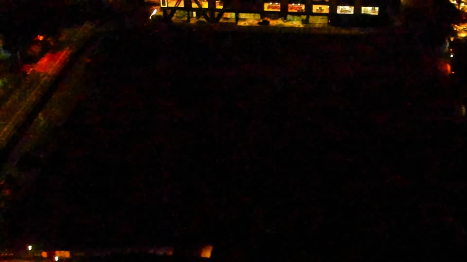 Construction camera frame at 3:00 AM PT. Visibility is too low to assess construction activity.