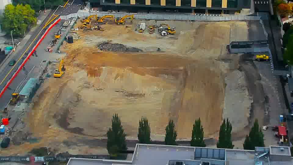 Construction camera frame at 10:15 AM PT. No visible change between these frames.
