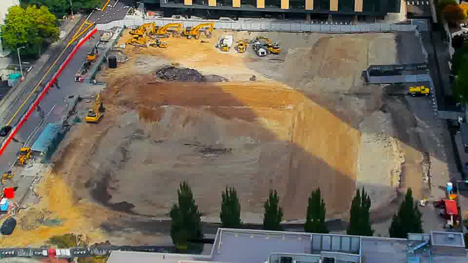 Construction camera frame at 11:00 AM PT. No visible change between these frames.