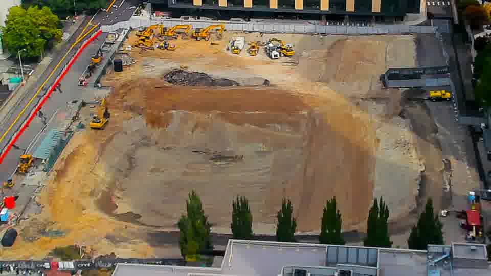 Construction camera frame at 11:15 AM PT. No visible change between these frames.
