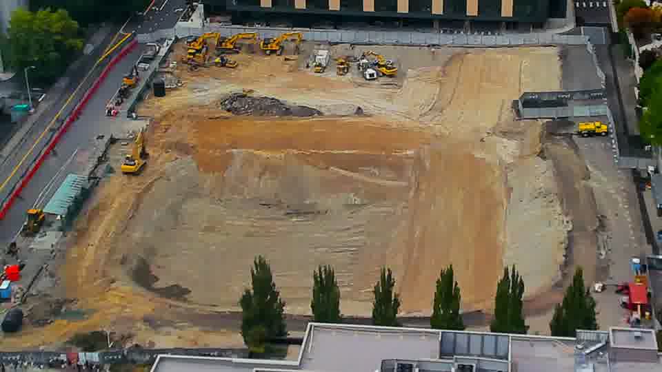 Construction camera frame at 4:15 PM PT. No visible change between these frames.