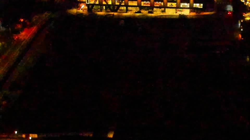 Construction camera frame at 6:00 AM PT. Visibility is too low to assess construction activity.