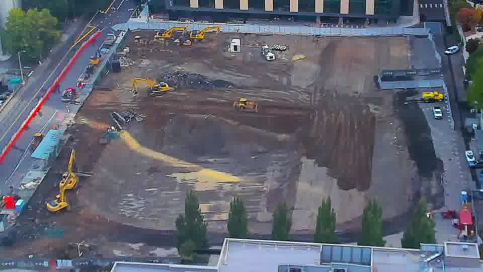 Construction camera frame at 9:15 AM PT. No visible change between these frames.