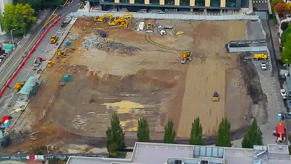 Construction camera frame at 2:15 PM PT. No visible change between these frames.
