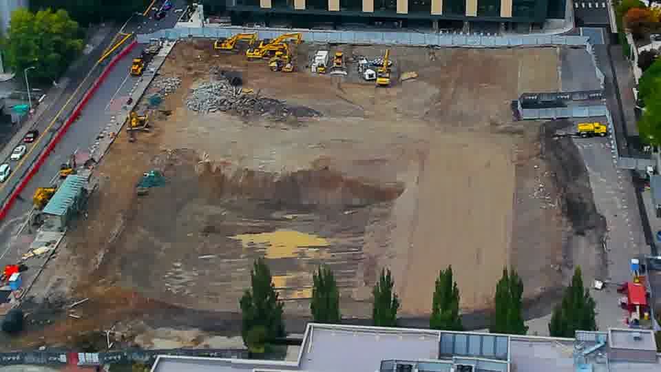 Construction camera frame at 6:15 PM PT. No visible change between these frames.