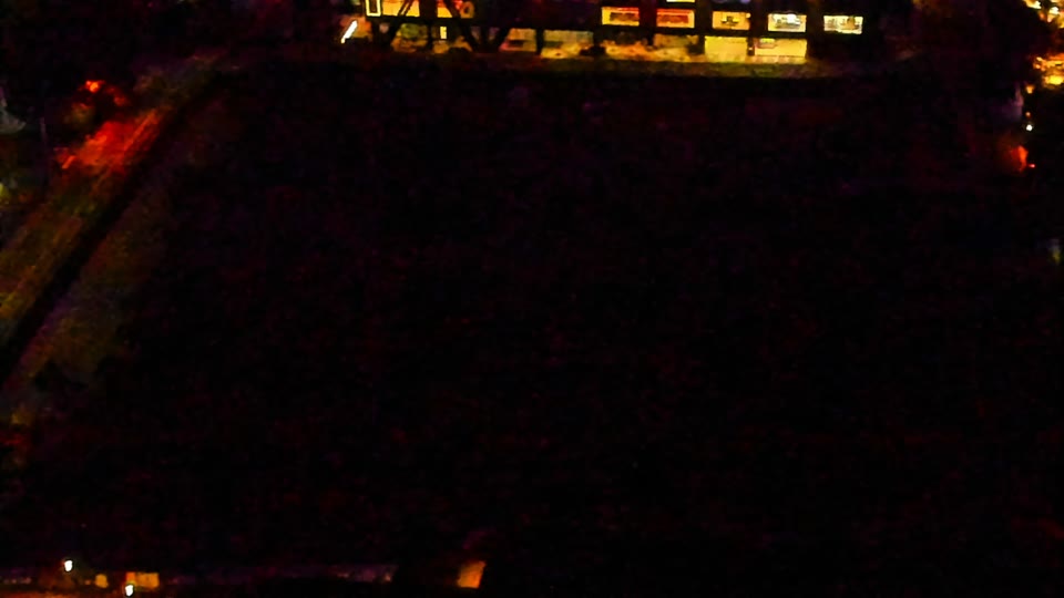 Construction camera frame at 3:00 AM PT. Visibility is too low to assess construction activity.