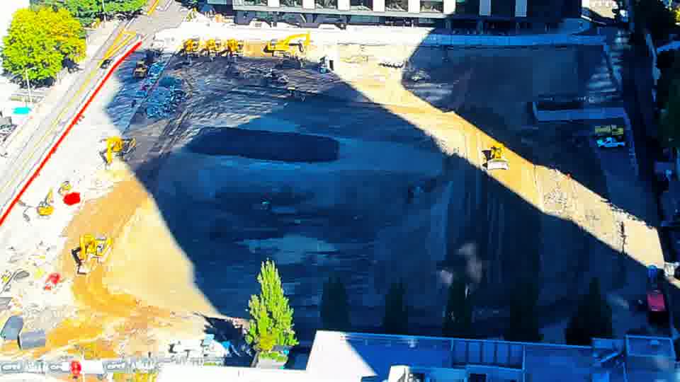 Construction camera frame at 11:15 AM PT. No visible change between these frames.
