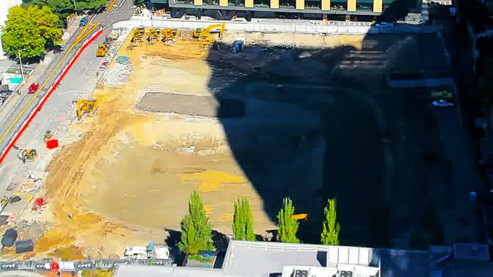 Construction camera frame at 11:45 AM PT. No visible change between these frames.