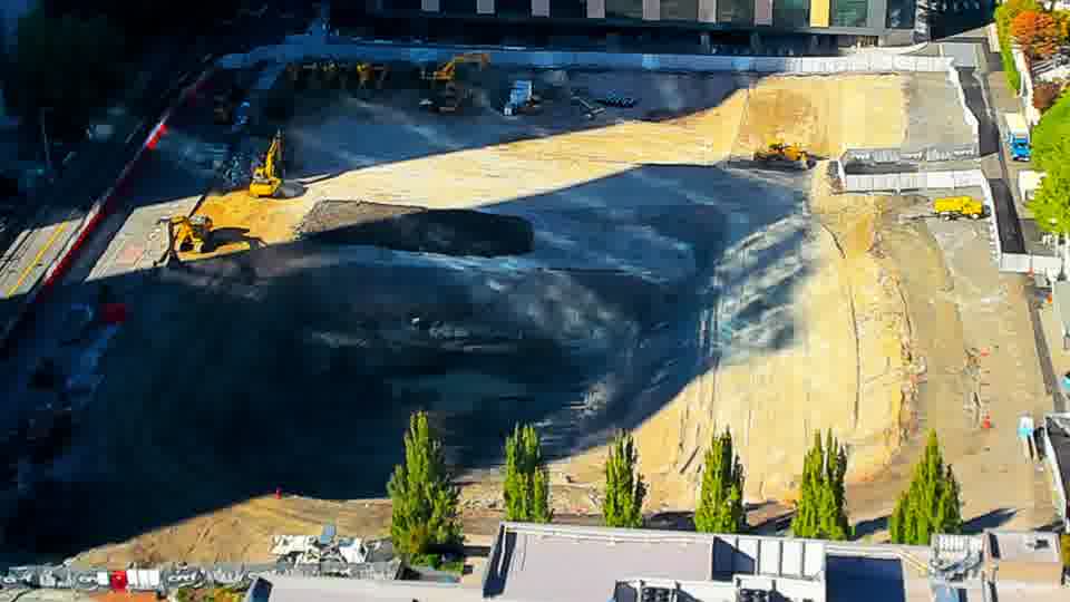 Construction camera frame at 4:15 PM PT. No visible change between these frames.