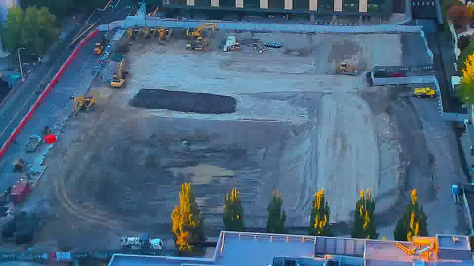 Construction camera frame at 7:00 PM PT. No visible change between these frames.