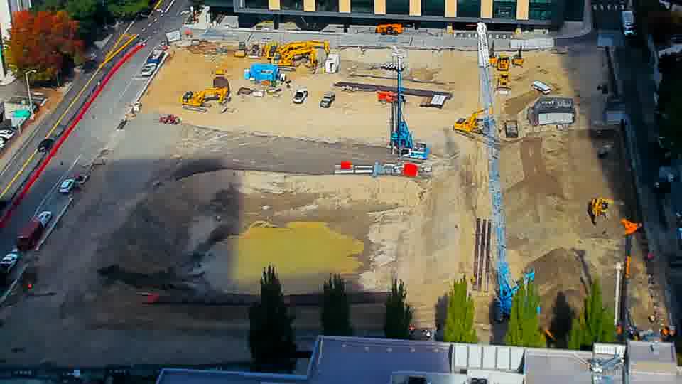Construction camera frame at 12:30 PM PT. No visible change between these frames.