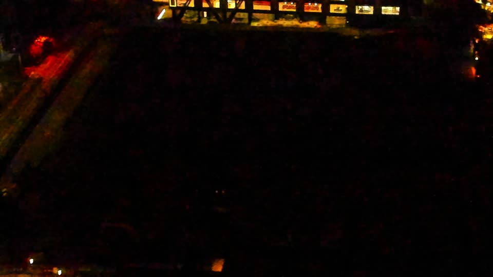 Construction camera frame at 2:00 AM PT. Visibility is too low to assess construction activity.