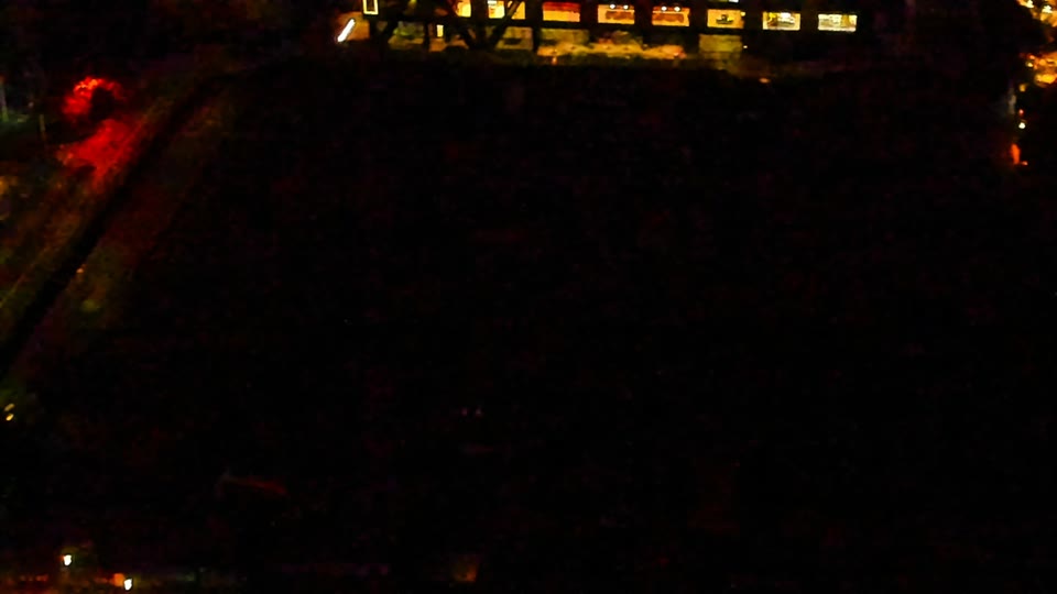 Construction camera frame at 3:00 AM PT. Visibility is too low to assess construction activity.