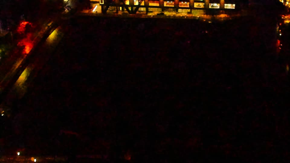 Construction camera frame at 6:00 AM PT. Visibility is too low to assess construction activity.